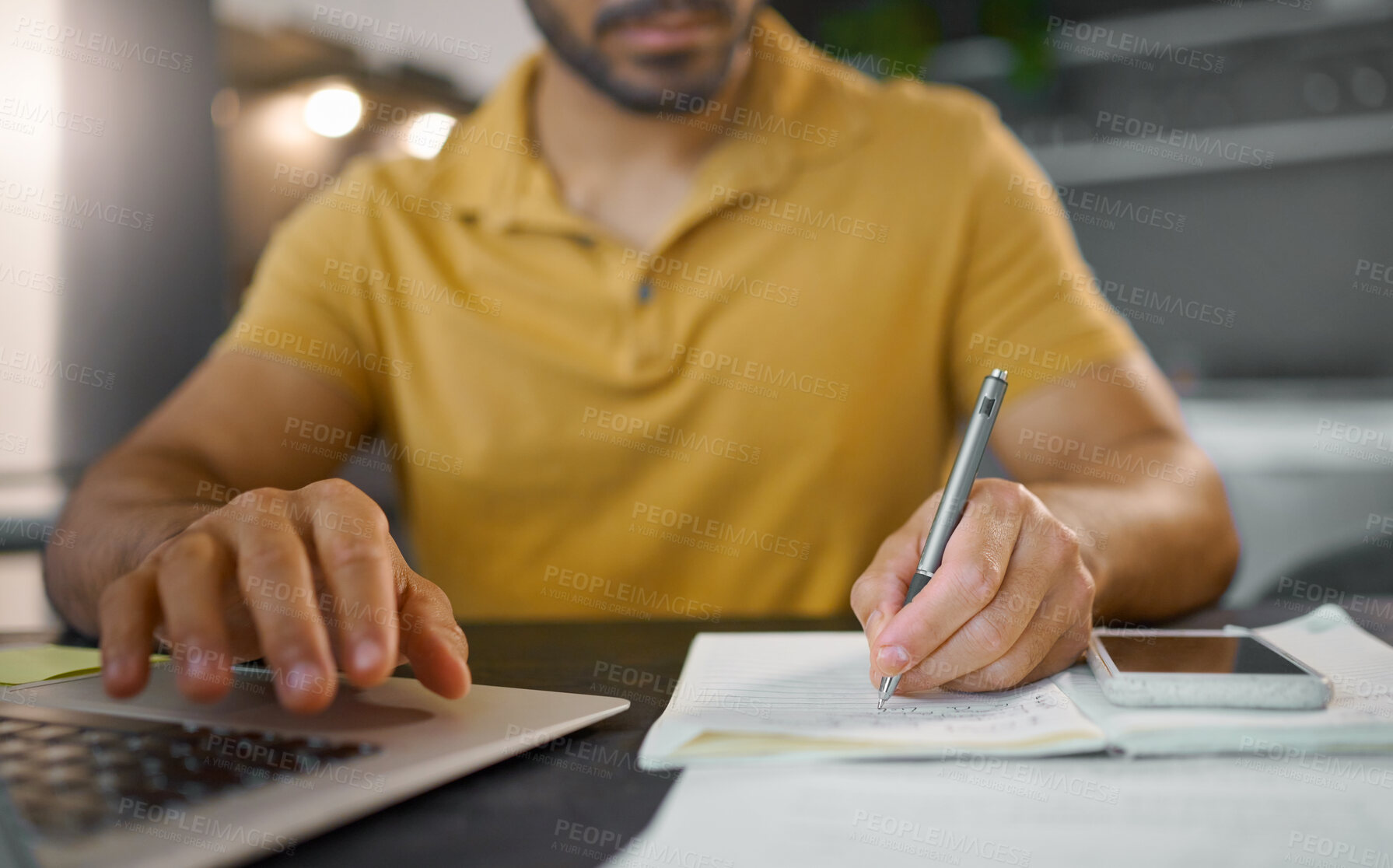 Buy stock photo Businessman, hands and writing with pen by laptop for accounting, finance or planning schedule at home. Hand of male, person or remote employee busy with paperwork, diary or book for financial plan
