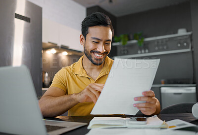 Buy stock photo Planning, smile and Asian man with paperwork and a laptop for finance budget, entrepreneurship and tax. Happy, summary and freelancer reading the proposal of a project, financial deal or report