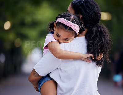 Buy stock photo Love, sad and mother carrying girl outdoors, bonding and hugging. Motherhood support, family care and woman embrace, hug or cuddle to comfort angry kid or child with anxiety, depression or problems.