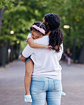Love, family and mother carrying girl outdoors, bonding and hugging. Motherhood support, care and woman embrace, hug or cuddle with sleeping daughter or kid and enjoying quality time together at park