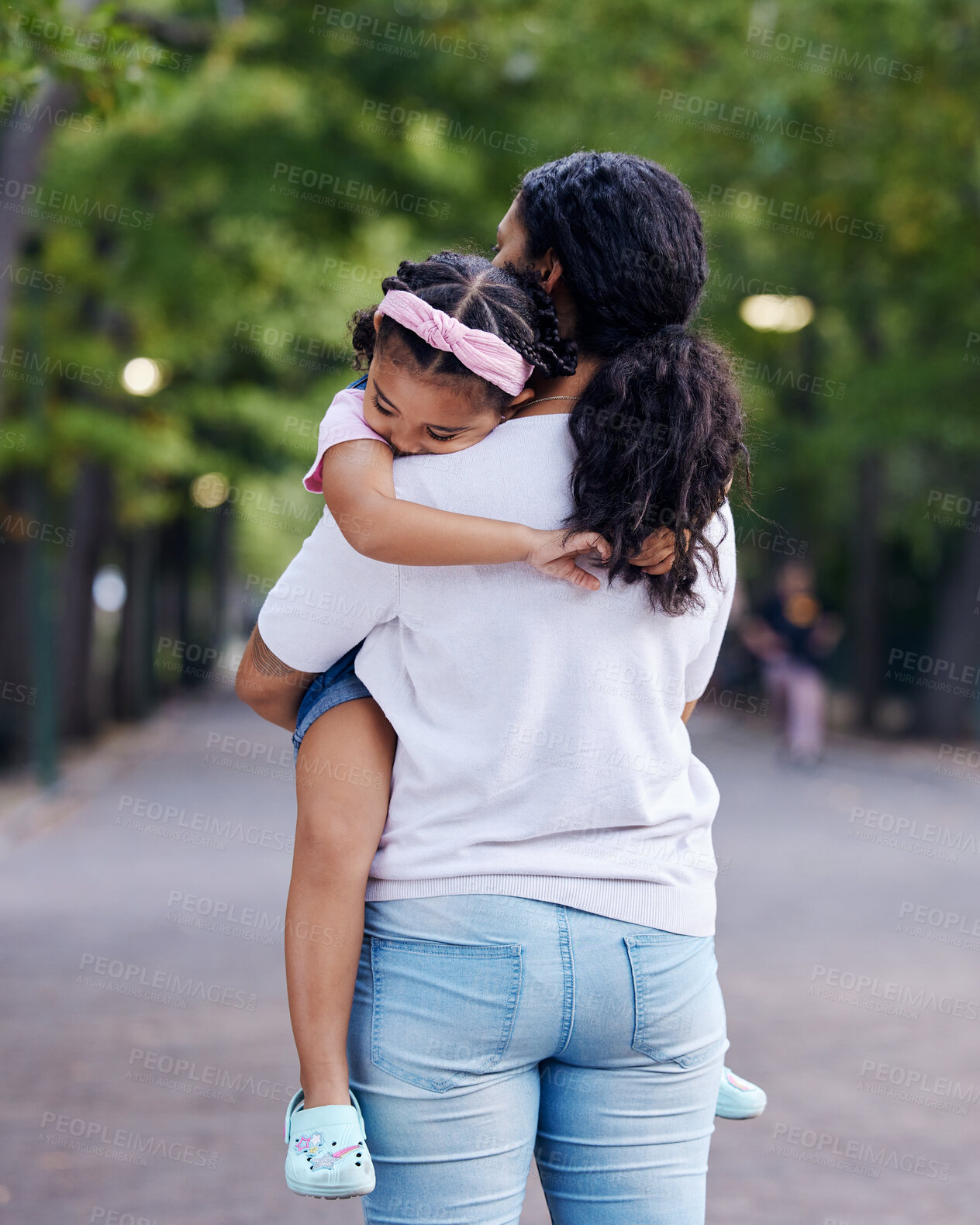 Buy stock photo Love, family and mother carrying girl outdoors, bonding and hugging. Motherhood support, care and woman embrace, hug or cuddle with sleeping daughter or kid and enjoying quality time together at park