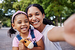 Girl, mom and selfie of a mother and girl portrait in a park with a happy smile outdoor. Happiness, family and mama love with parent care for child on vacation together of a woman and young person
