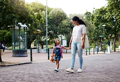 Buy stock photo Park, walking and mom holding hands with girl enjoy weekend, summer holiday and adventure outdoors. Love, black family and mother with child in morning for back to school, kindergarten and education
