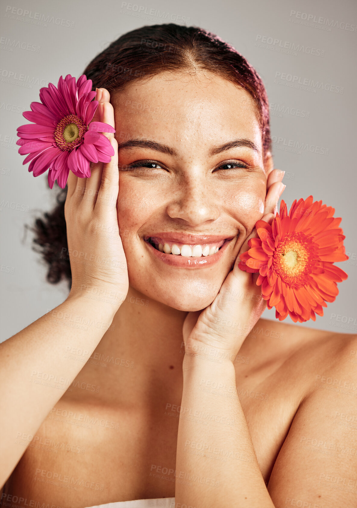 Buy stock photo Skincare, daisy flower and beauty portrait of a woman for dermatology, makeup and cosmetics. Facial, wellness and self care for skin glow, floral product and happy face of a natural model in studio