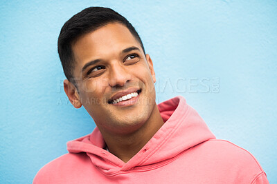 Buy stock photo Smile, thinking and face of man on blue background with positive mindset, ideas and vision for future. Mockup, planning and isolated headshot of male with confidence, attitude and creative thoughts