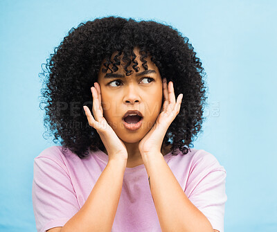 Buy stock photo Shock, surprise face and black woman with isolated blue background in a studio. Wow, thinking and hands of a young person hearing a secret or surprising announcement feeling confused and annoyed