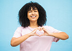 Heart hand sign, black woman and smile portrait of a young person showing love gesture. African female, happiness and excited space with hands making emoji shape with blue studio background isolated