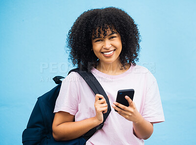 Buy stock photo Portrait, student and black woman with bag, phone and tech on blue background. Happy girl, backpack and young person with mobile on social media, educational app or reading online internet connection