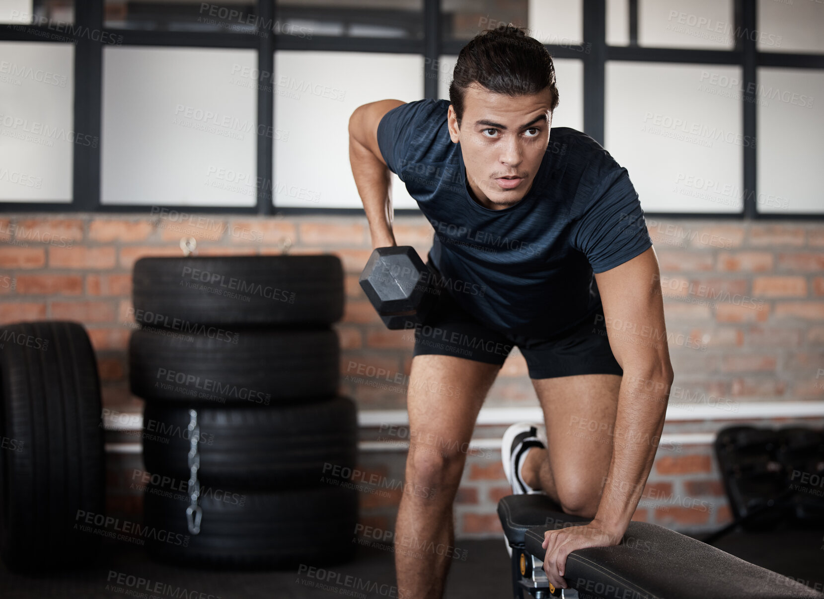 Buy stock photo Fitness, bench and dumbbell with a sports man training in a gym for strong or healthy muscles. Mindset. exercise and weightlifting with a male athlete or bodybuilder in a health club for a workout