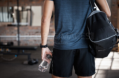 Buy stock photo Exercise, bag and back of man in gym ready to start workout. Sports, fitness and hands of male athlete with water bottle for hydration and preparing for training and exercising for health or wellness