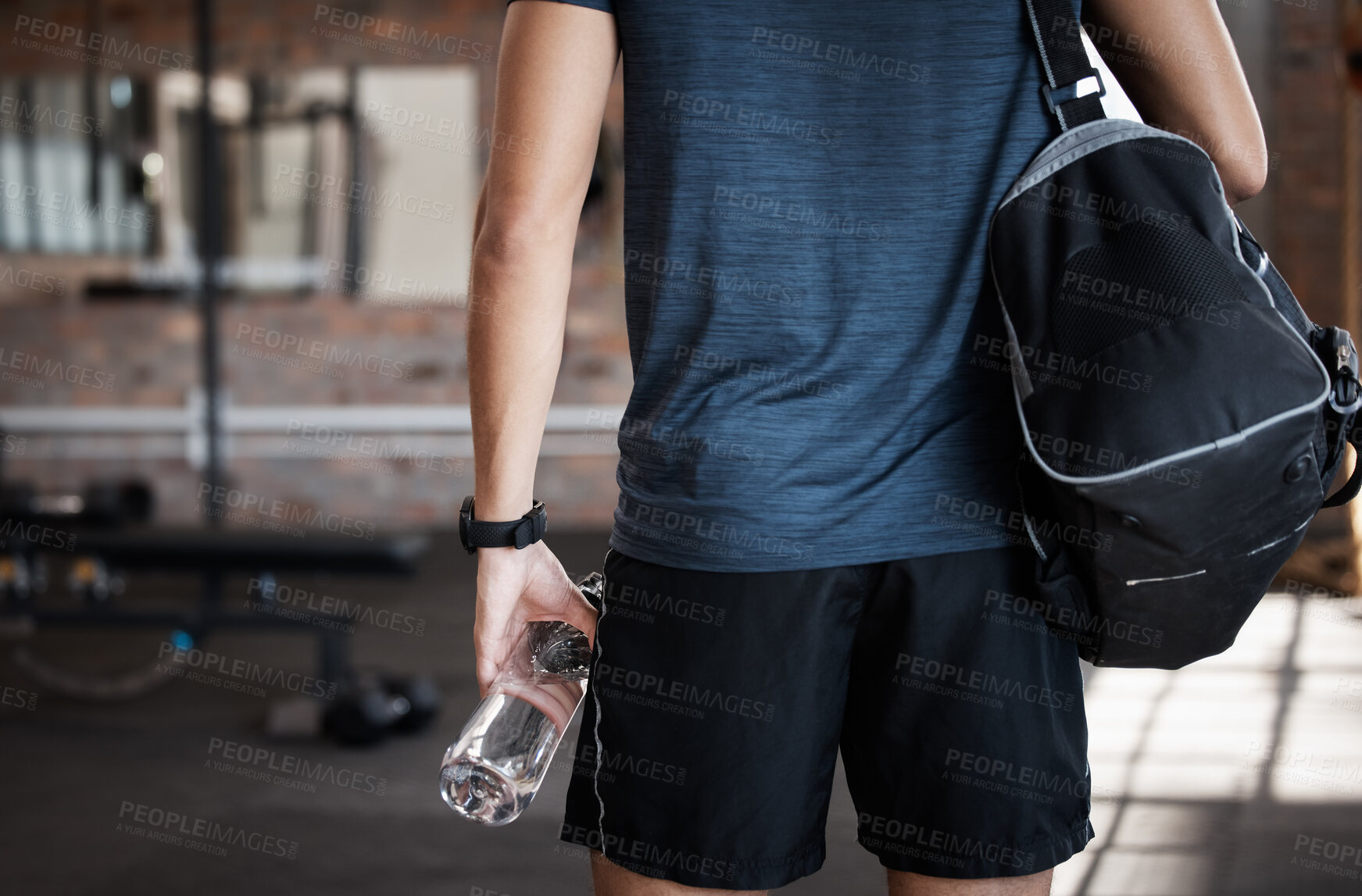 Buy stock photo Exercise, bag and back of man in gym ready to start workout. Sports, fitness and hands of male athlete with water bottle for hydration and preparing for training and exercising for health or wellness