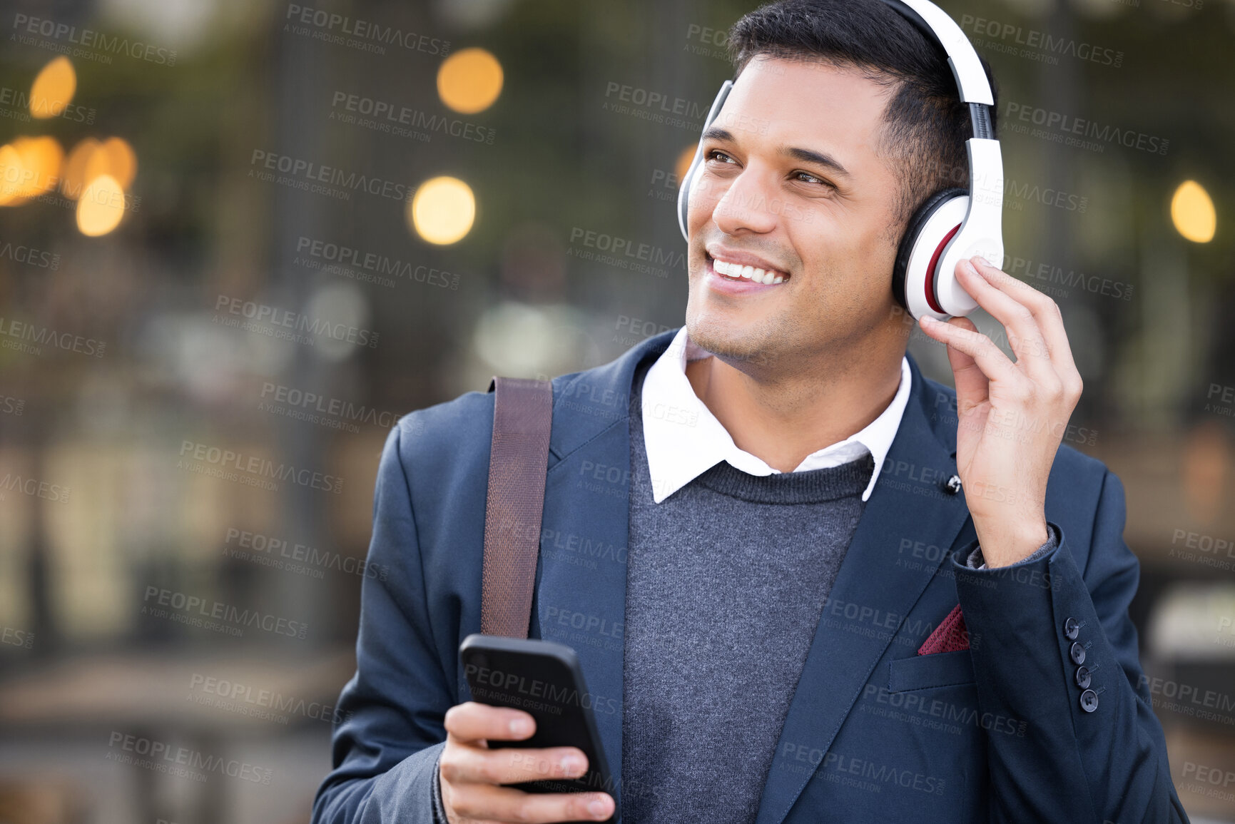 Buy stock photo Headphones, business man and outdoor phone listening with music streaming ready for work. Radio, mobile 5g connection and young professional with web podcast on technology and internet with bokeh