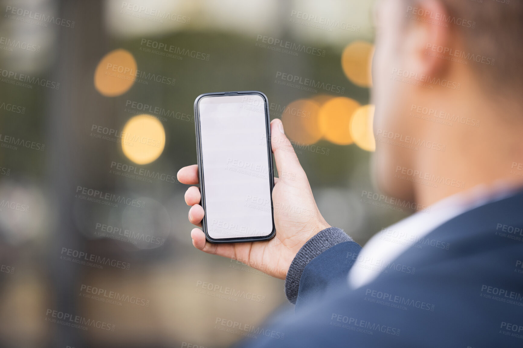 Buy stock photo Businessman, hand and mockup phone in city for schedule planning app, email communication or networking. Man, smartphone mockup space and reading screen for calendar, web article and financial news