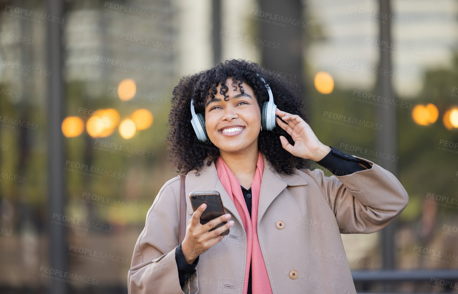 Buy stock photo Black woman listening to music in city travel for mental health, energy and calm podcast with a smile. Happy, urban student in headphones or audio technology, streaming app on her way to university