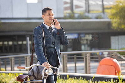 Buy stock photo Phone call, bicycle and commute with a business man in the city using eco friendly transport for work travel. Mobile, bike and communication with a male employee thinking about his carbon footprint
