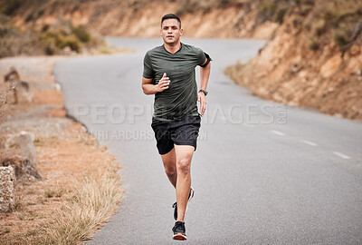 Fitness, running and man in road for exercise, training and workout with body lose weight, muscle and energy. Focus runner, athlete or healthy person jogging for sports challenge in nature street