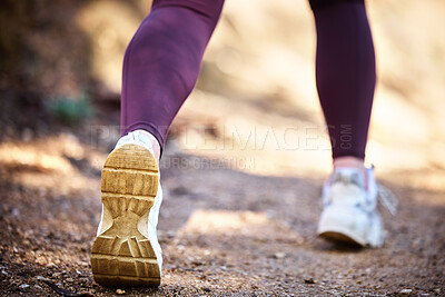 Buy stock photo Running, health and shoes of woman in nature park for workout, fitness and cardio training. Wellness, sports and stamina endurance with girl runner jogging in forest for progress goals, exercise