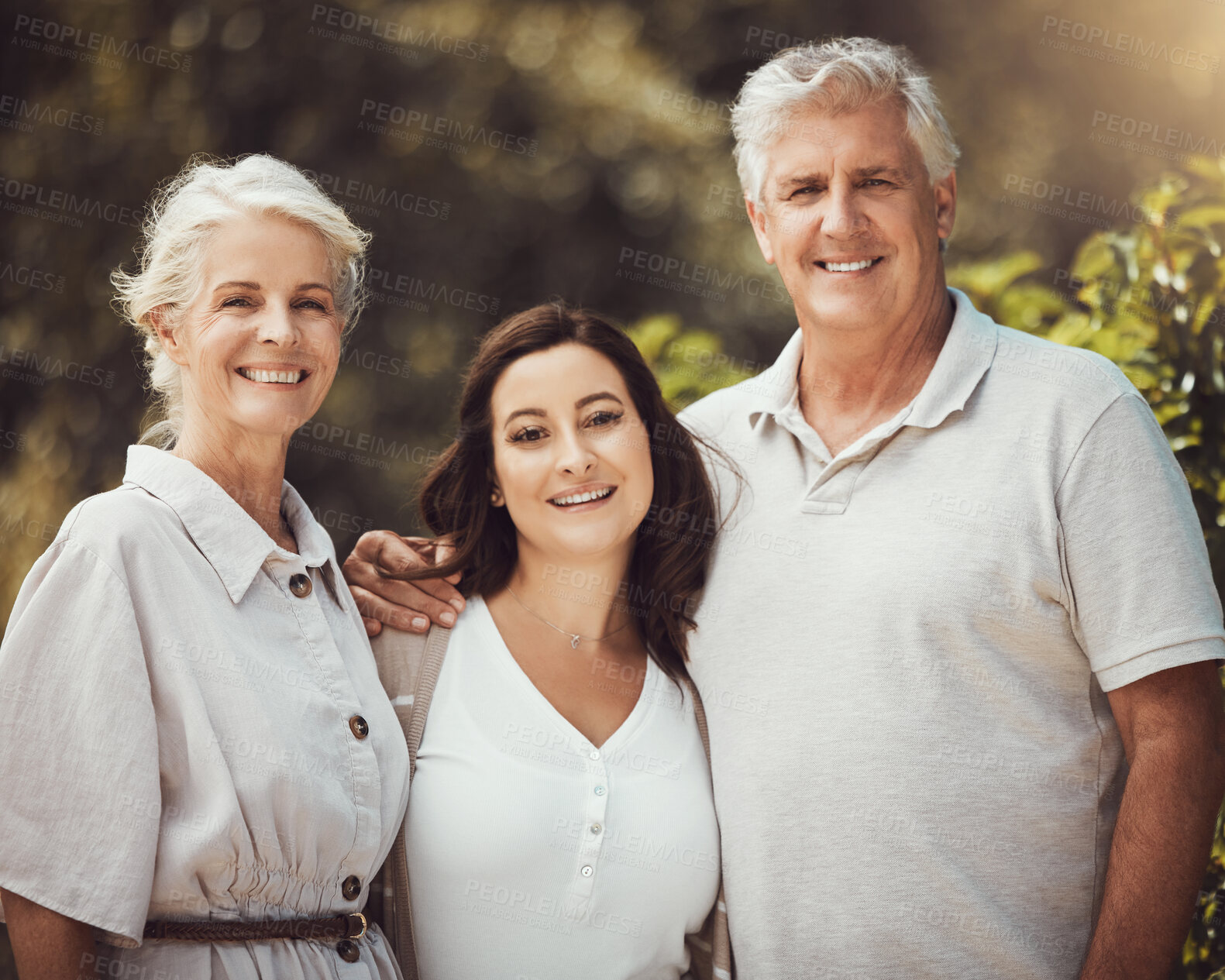 Buy stock photo Happy family, portrait and bonding with senior parents, mother or father in nature park, home backyard or house garden. Smile, woman and retirement elderly in hug for love, support and daughter trust