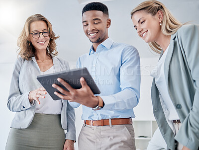 Buy stock photo Tablet, collaboration and research with a business team talking in the office for growth or development. Planning, diversity or teamwork with a man and woman employee group using the internet at work