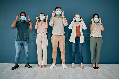 Buy stock photo Portrait, covid and group of business people in office for health and safety. Teamwork, compliance and employees, men and women with face mask or ppe to stop corona virus for wellness in workplace.