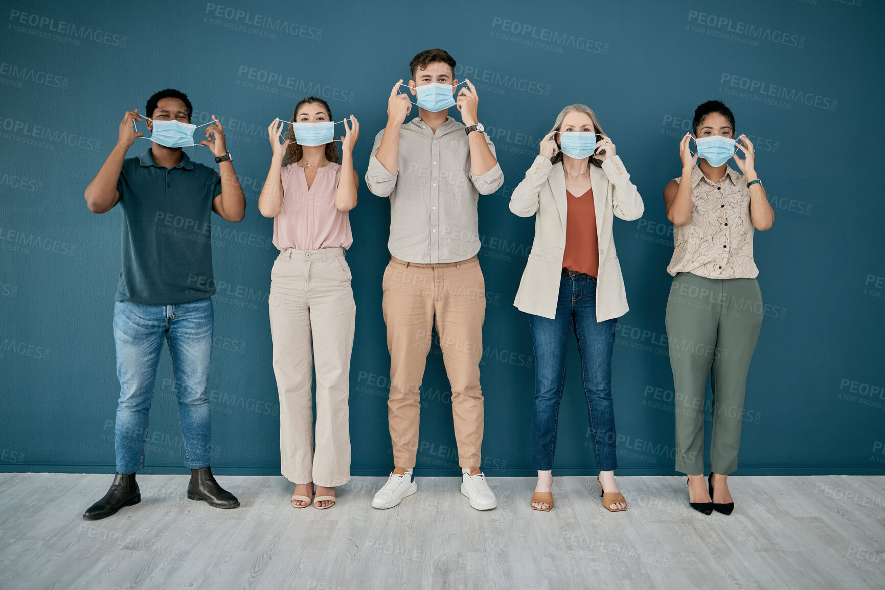 Buy stock photo Portrait, covid and group of business people in office for health and safety. Teamwork, compliance and employees, men and women with face mask or ppe to stop corona virus for wellness in workplace.