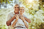Elderly, couple with hug in park and love with marriage portrait, retirement travel together with commitment outdoor. Old man, woman and care with trust and support, nature mockup and happiness