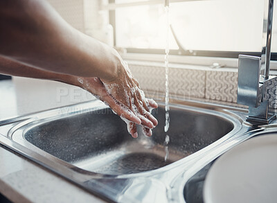 Buy stock photo Cleaning, health or washing hands in kitchen with soap for skincare, self care or hygiene with tap water. Safety, zoom or healthy person at a sink for liquid protection against bacteria after cooking