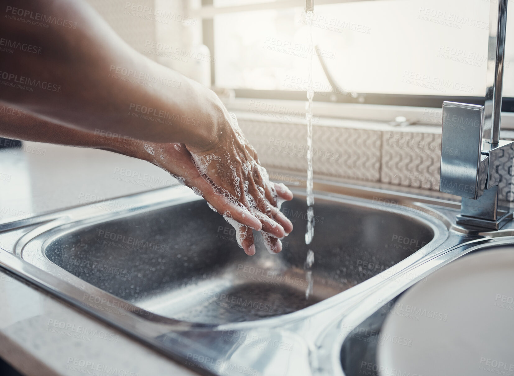 Buy stock photo Cleaning, health or washing hands in kitchen with soap for skincare, self care or hygiene with tap water. Safety, zoom or healthy person at a sink for liquid protection against bacteria after cooking