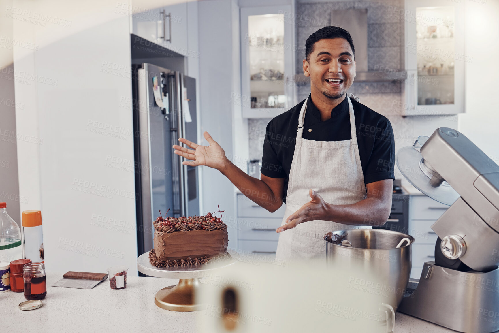 Buy stock photo Man, chef and talking in kitchen on vlog, live streaming and recording a cake dessert tutorial on social media. Happy baker, digital content creator or food influencer filming a virtual cooking class