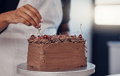 Buy stock photo Hand, cake and food with a man chef working in a kitchen while preparing dessert for a party celebration. Cooking, chocolate and cherries with a male at work in a bakery to make gourmet confectionary