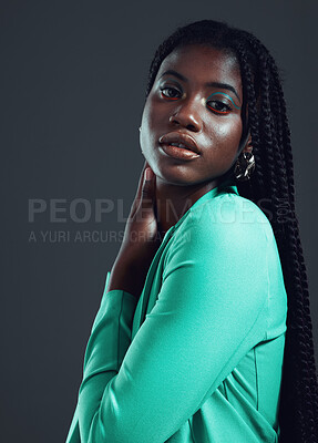 Fashion, stylish and portrait of a confident black woman isolated on a black background in studio. Fashionable, attractive and face of an African model with confidence and empowerment on a backdrop