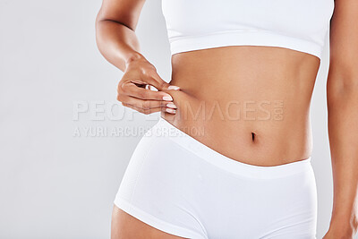 Weight loss, stomach and measure tape for body measurement for health,  wellness and healthy diet. F Stock Photo by YuriArcursPeopleimages