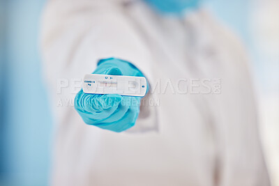 Buy stock photo Doctor, hand and covid 19 test results in laboratory, hospital and gloves for safety, health and protection at work. Professional medic, diagnosis and help for healthcare, wellness and medical advice