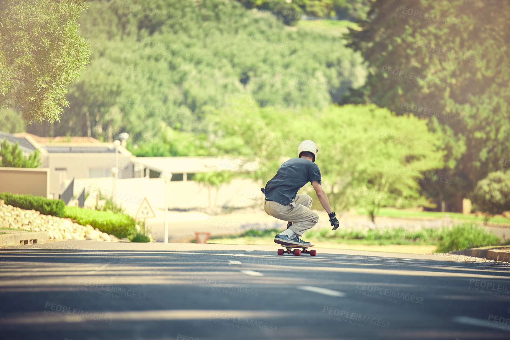 Buy stock photo Skateboard, road and mockup with a sports man skating or training outdoor while moving at speed for action. Fitness, exercise and street with a male skater or athlete outside to practice his balance