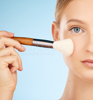 Buy stock photo Woman, studio portrait and makeup brush for cosmetics, foundation or beauty aesthetic by blue background. Healthy model, cosmetic application and natural skin glow with self care tools by backdrop