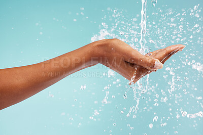 Buy stock photo Hands, woman and water splash for washing, skincare and healthy beauty on studio background. Closeup of person cleaning body, drops and palm in bathroom for wellness, shower and aesthetic self care