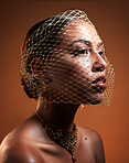 Net veil, retro and face of a fashionable woman of fashion isolated on a brown studio background. Elegance, makeup and stylish vintage model with a fancy, classic and glamour accessory on a backdrop