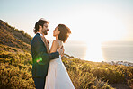Wedding, love and couple on mountain for marriage ceremony, commitment and celebration. Romance, happiness and interracial bride and groom bonding, share intimate moment and smile by ocean in Italy