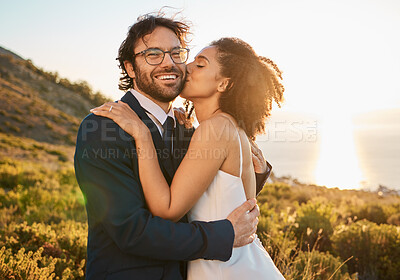 Buy stock photo Love, kiss and wedding with couple in nature for celebration, happiness and romance. Sunset, hug and affectionate with man and woman in embrace at countryside for happy, marriage and smile together