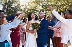 Wedding confetti, marriage couple and celebration of audience throwing flower petals outdoor. Happiness, excited and social event with bride and man laughing from love and congratulations applause 