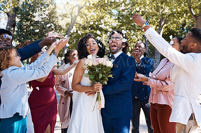 Buy stock photo Wedding confetti, marriage couple and celebration of audience throwing flower petals outdoor. Happiness, excited and social event with bride and man laughing from love and congratulations applause 