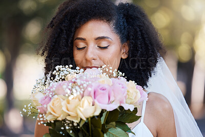 Buy stock photo Eyes closed, bride and black woman with flowers at wedding outdoors. Face, marriage and beauty of female smelling floral bouquet of roses to celebrate at party, ceremony event or love celebration