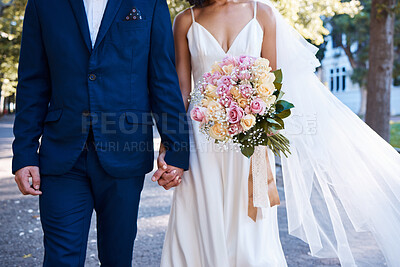 Buy stock photo Bouquet, wedding and love of bride, groom and outdoor photograph at celebration, event or reception. Roses, flowers and marriage of bridal couple, romance and park in commitment, union or partnership