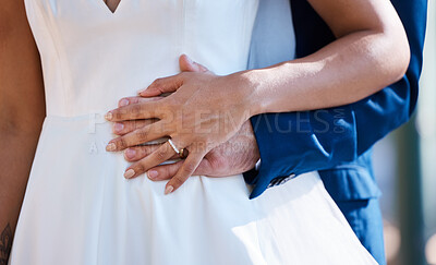 Buy stock photo Hands, married and interracial wedding of couple for outdoor celebration of partnership, care and love. Marriage commitment and support of bride with groom at event with embrace for togetherness.