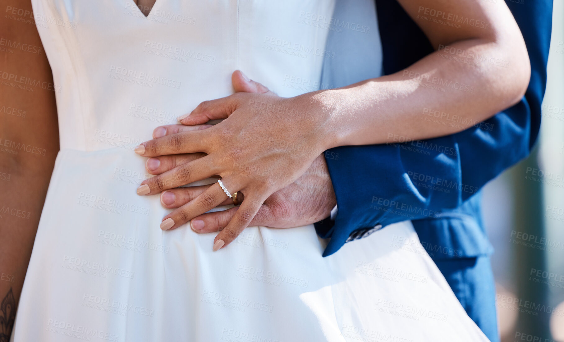 Buy stock photo Hands, married and interracial wedding of couple for outdoor celebration of partnership, care and love. Marriage commitment and support of bride with groom at event with embrace for togetherness.