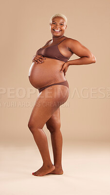 Buy stock photo Pregnant, portrait and black woman isolated on studio background for beauty, skincare and happy abdomen health. Underwear, body and african model or person pregnancy for wellness, care and self love