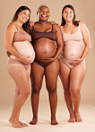 Pregnant, body and portrait of women in belly support touch, hope and community diversity on studio background. Smile, happy and pregnancy friends in underwear, stomach growth and healthcare wellness