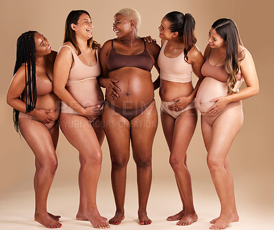 Buy stock photo Women group, pregnant or body and stomach touch in baby support, diversity solidarity or excited on studio background. Smile, happy or pregnancy friends in underwear, funny joke or comic belly growth