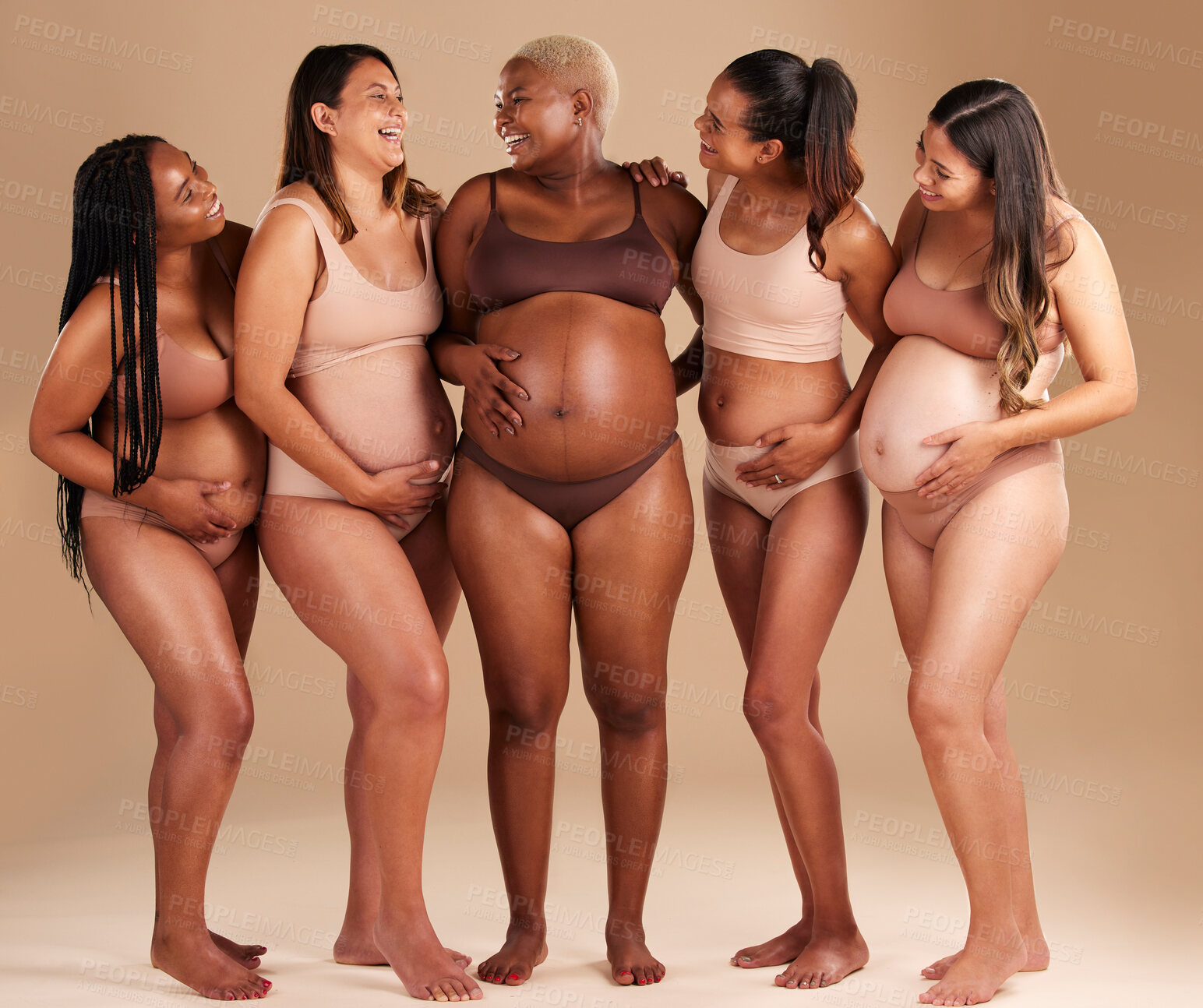 Buy stock photo Women group, pregnant or body and stomach touch in baby support, diversity solidarity or excited on studio background. Smile, happy or pregnancy friends in underwear, funny joke or comic belly growth