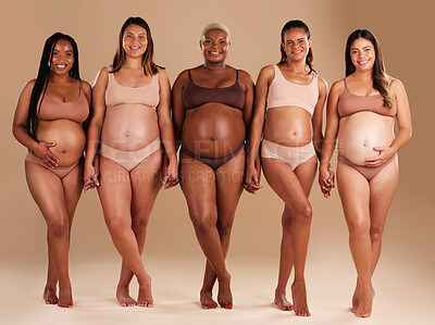 Buy stock photo Pregnant, women or diversity portrait with stomach on studio background in body love, baby or community support. Smile, happy or pregnancy friends in underwear for tummy growth or mothers empowerment